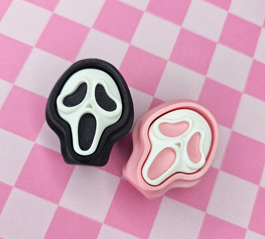 Spooky Face Fidget Clicker (Pink)
